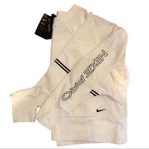 Nike Pro Loose Fit cropped white sweater. NWT. Size L. Women’s.